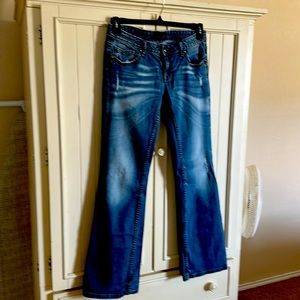 Rerock jeans by Express size 6 R .